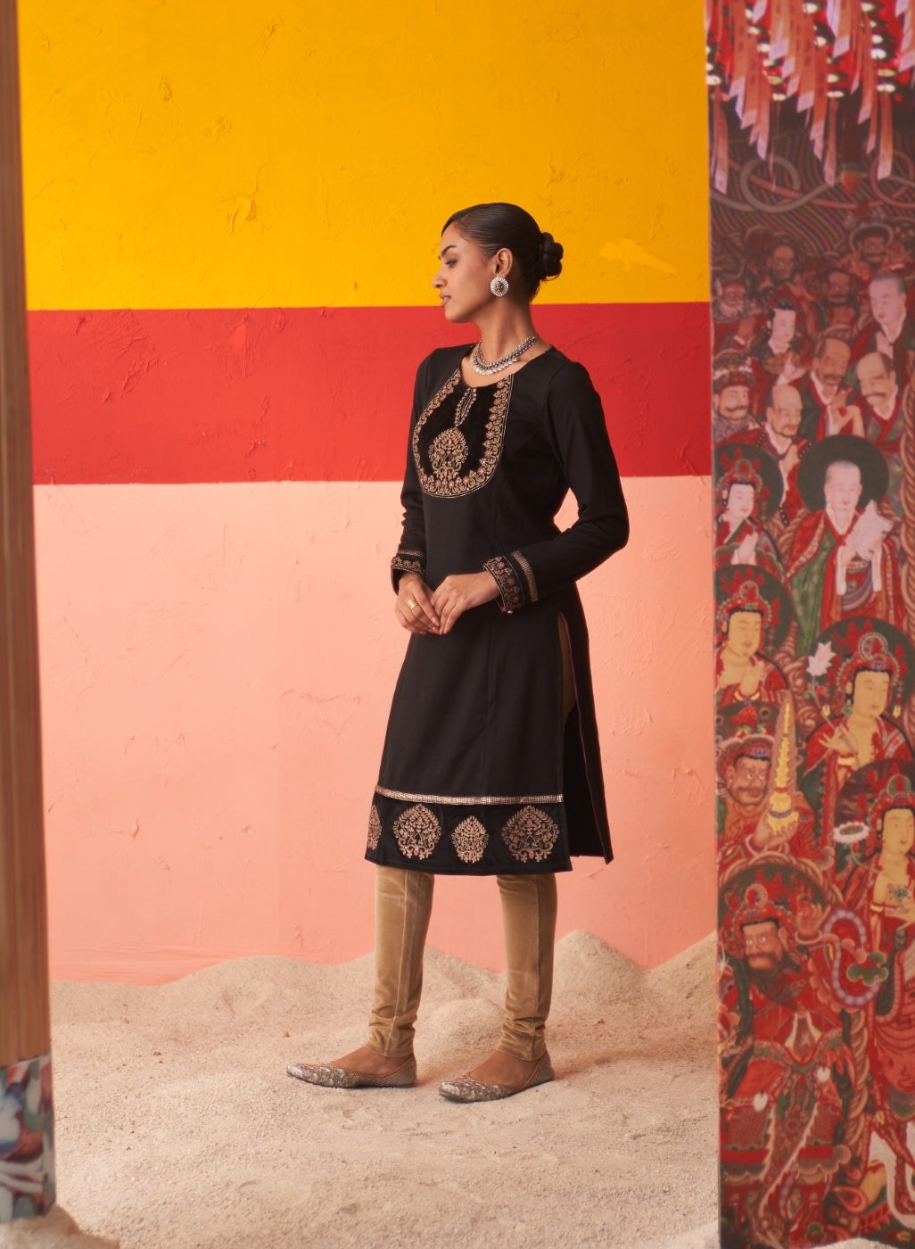 Black Women Woollen Kurti With Embroidered Yoke And Button Detailing On Cuffs