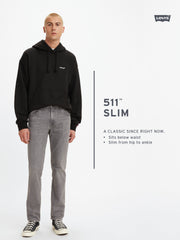 Men's Levi's 511 slim fit blue mid-rise jeans showing classic denim style with a slim silhouette and five-pocket design.