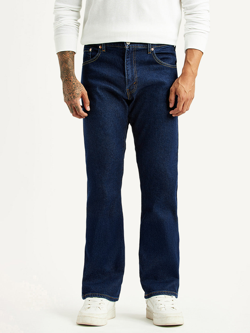 Levi's men's dark blue 517 bootcut jeans with mid-rise waist, front view showing classic fit and sturdy denim fabric.