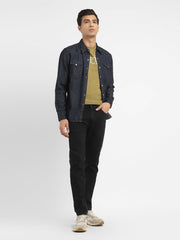 Levi's men's 511 black slim fit mid-rise jeans displayed on a model, showcasing the modern style and fit.