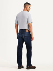 Back view of Levi's men's 511 dark blue slim fit hyper stretch jeans showing fit and stitching details.
