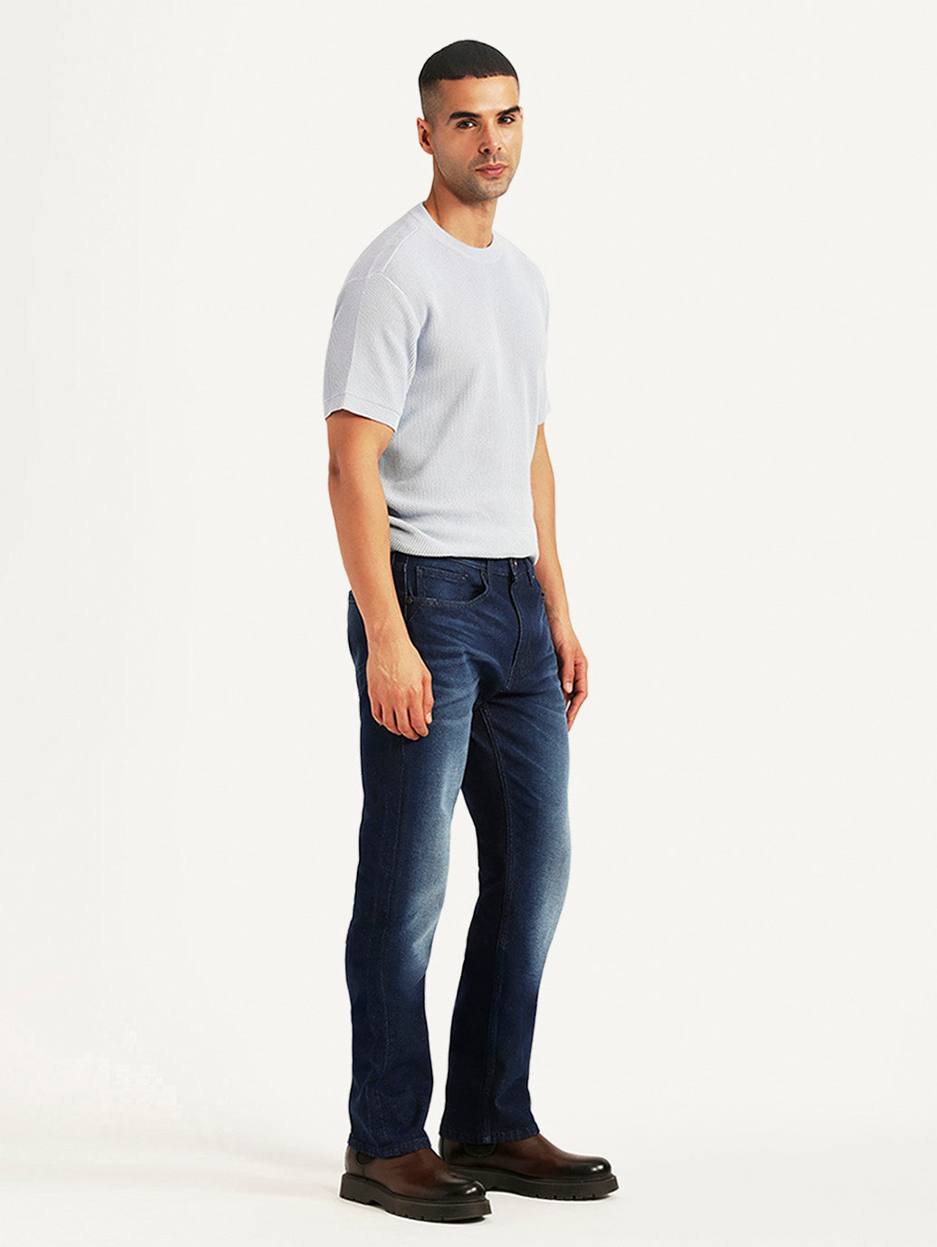 Levi's men's 511 dark blue slim fit hyper stretch jeans shown from the side, highlighting the modern fit and stretch fabric.