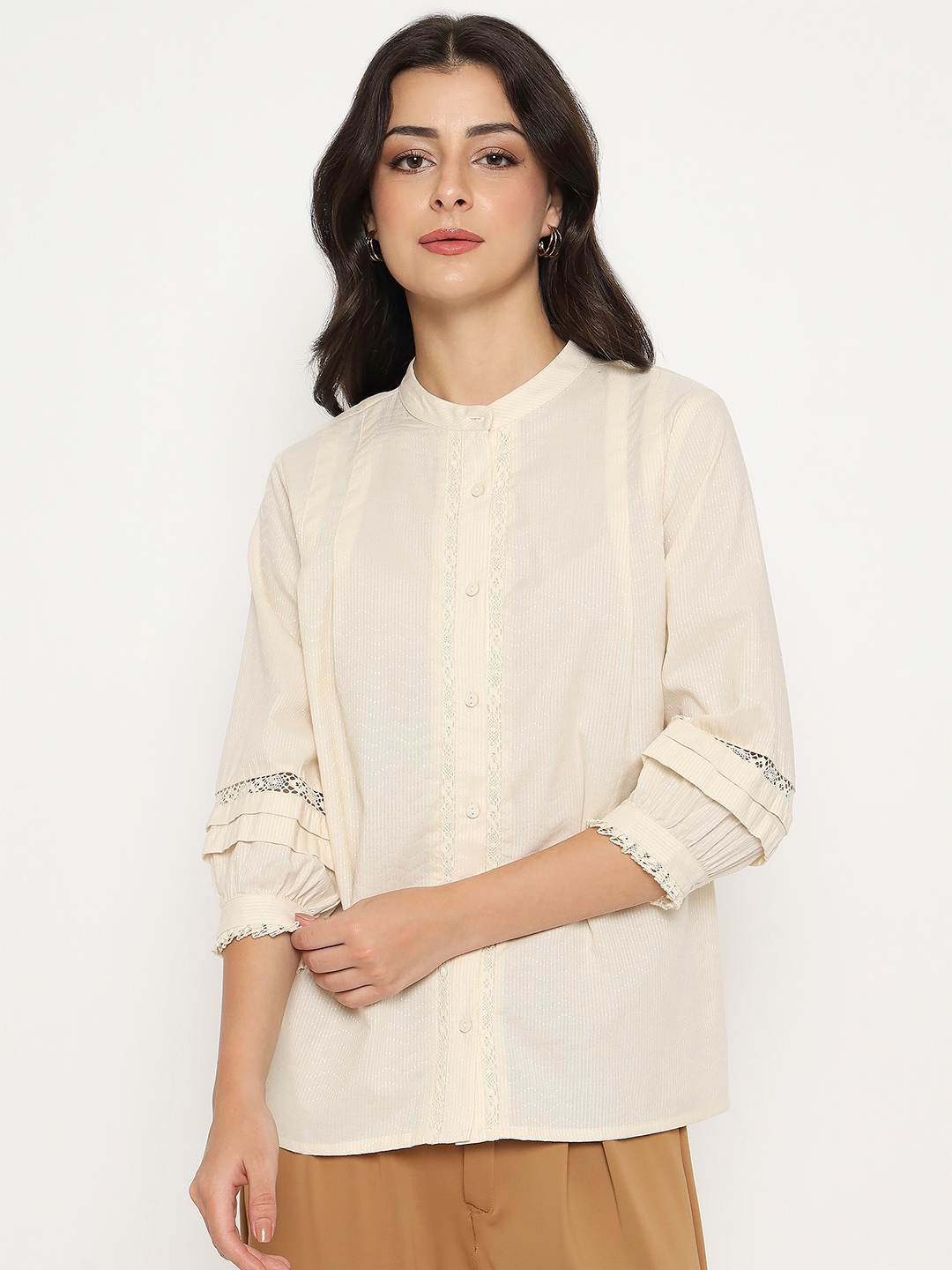 Madame Ladies Western top with long sleeves and button closure, stylish upper garment for Western-inspired fashion.