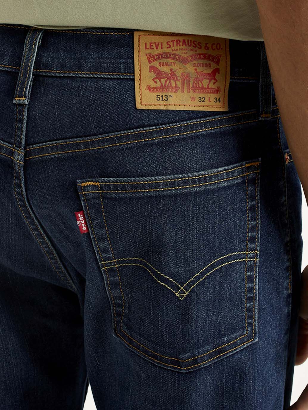 Levis men's jeans 23677-0351 with classic denim fabric, front pockets, and belt loops, shown in a close-up detail image.
