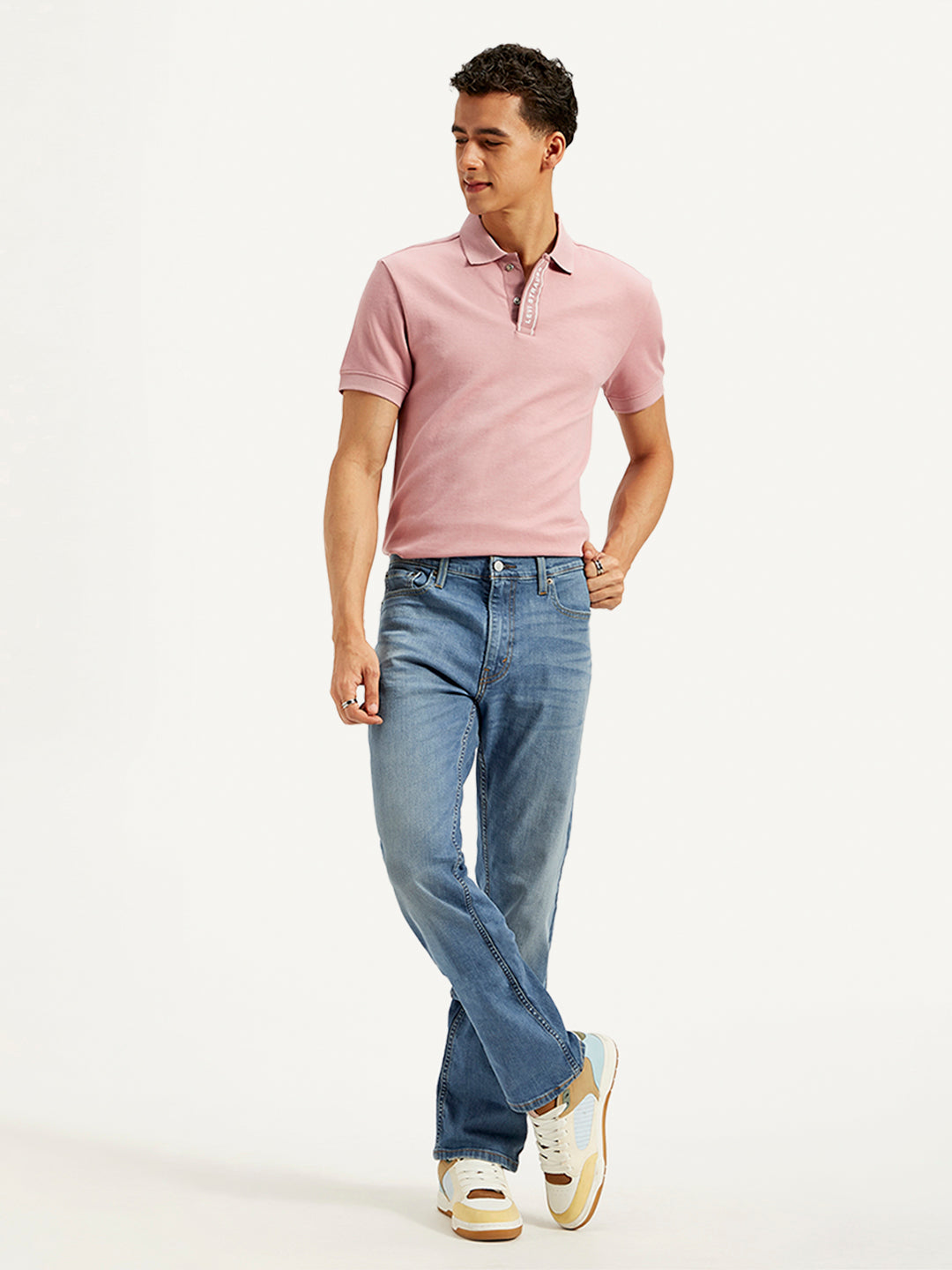 Levi's men's jeans in style 23677-0352, classic fit with five-pocket design, denim fabric, and belt loops.