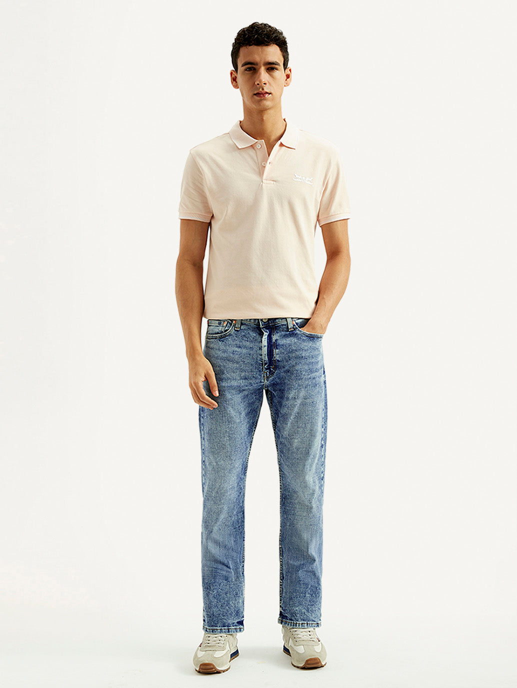 Levi's men's jeans 23677-0390 in classic blue denim, front view showing slim fit and traditional five-pocket design.