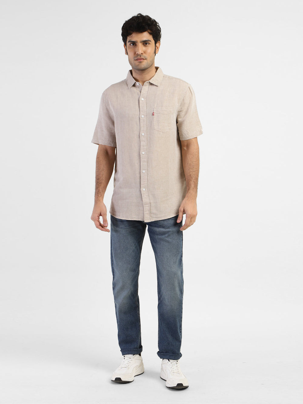 Levis men's solid slim fit linen casual shirt, front view showing lightweight fabric and tailored fit for a stylish look.