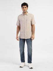 Levis men's solid slim fit linen casual shirt, front view showing lightweight fabric and tailored fit for a stylish look.
