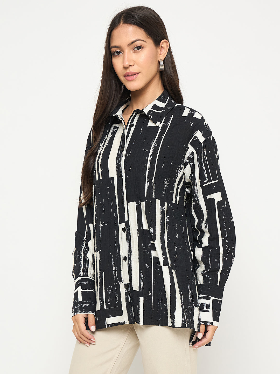 Madame Ladies Western top shown in black, long-sleeve style with Western-inspired design, displayed on a hanger.