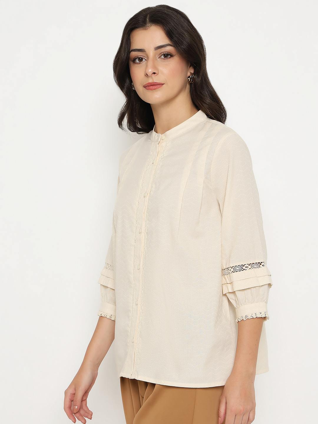 Madame Ladies Western top, long-sleeve, button-up style with Western-inspired design, displayed on a hanger.