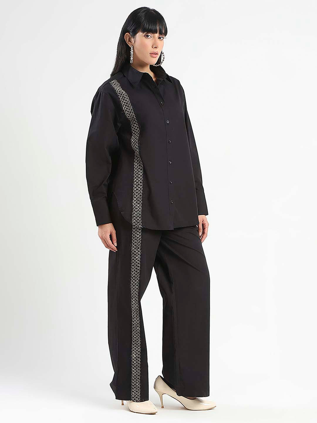 Madame Ladies Western fashion set featuring stylish upper wear with intricate Western-inspired details and accessories.