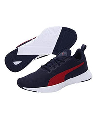 Puma unisex adult Robust Peacoat-Red Dahlia running shoe in size 11 kids UK, featuring red and navy athletic design.