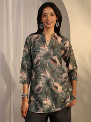 Green printed cotton blend straight short kurti for women, Libas brand, with a vibrant floral design and short sleeves.