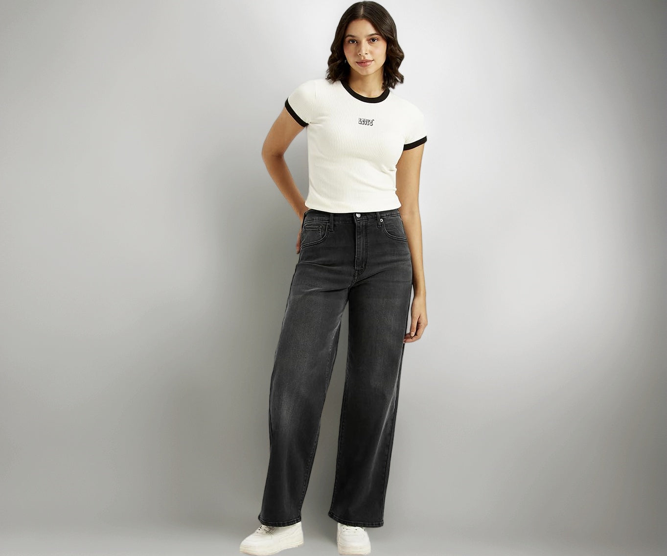 Levi's women's charcoal grey high-rise wide-leg jeans with mile-high fit, shown on a model standing against a neutral background.