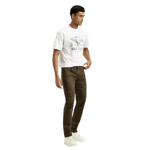 Levi's men's brown 511 slim fit mid-rise jeans displayed on a hanger, showcasing classic five-pocket style and tapered leg design.