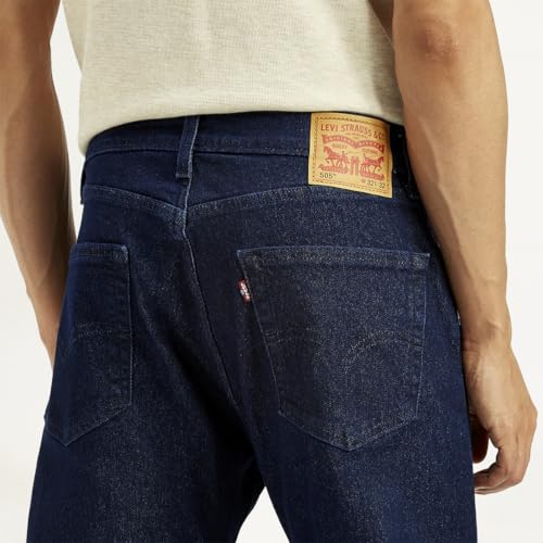 Levi's men's regular fit blue jeans with classic five-pocket design, made from durable denim fabric.