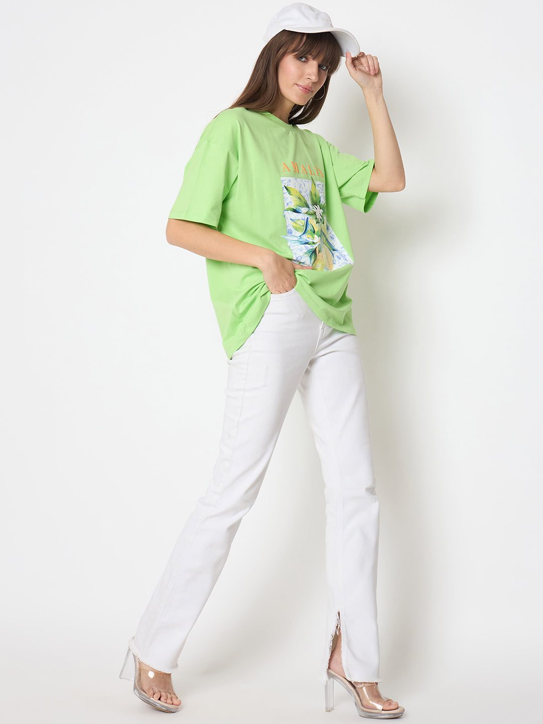 Green cotton blend short sleeve T-shirt with botanical print by Madame, perfect for casual Western-style women's tops.