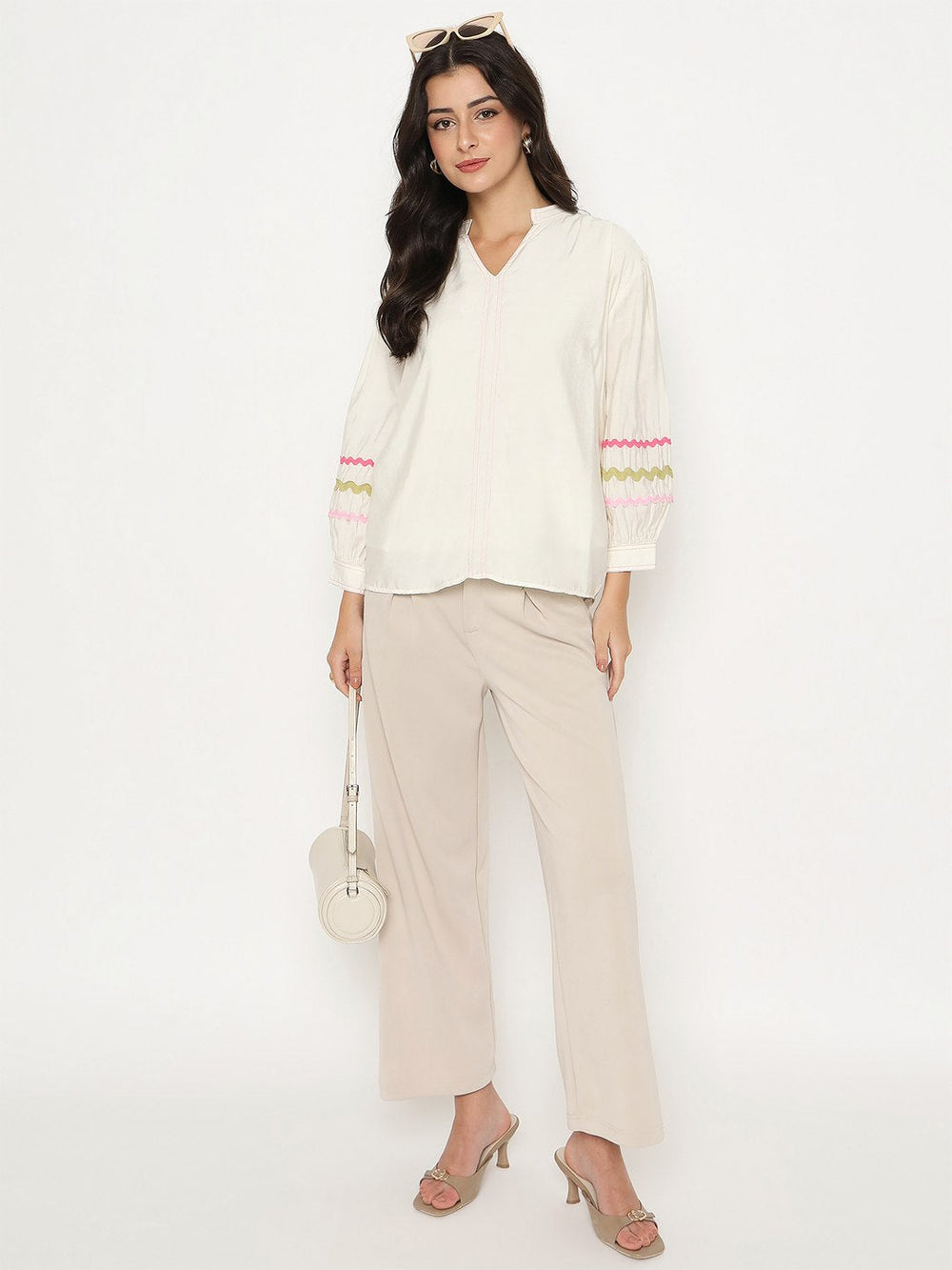 Madame Ladies Western Off-White Long Sleeve Top, casual style, displayed on a hanger with visible fabric details.