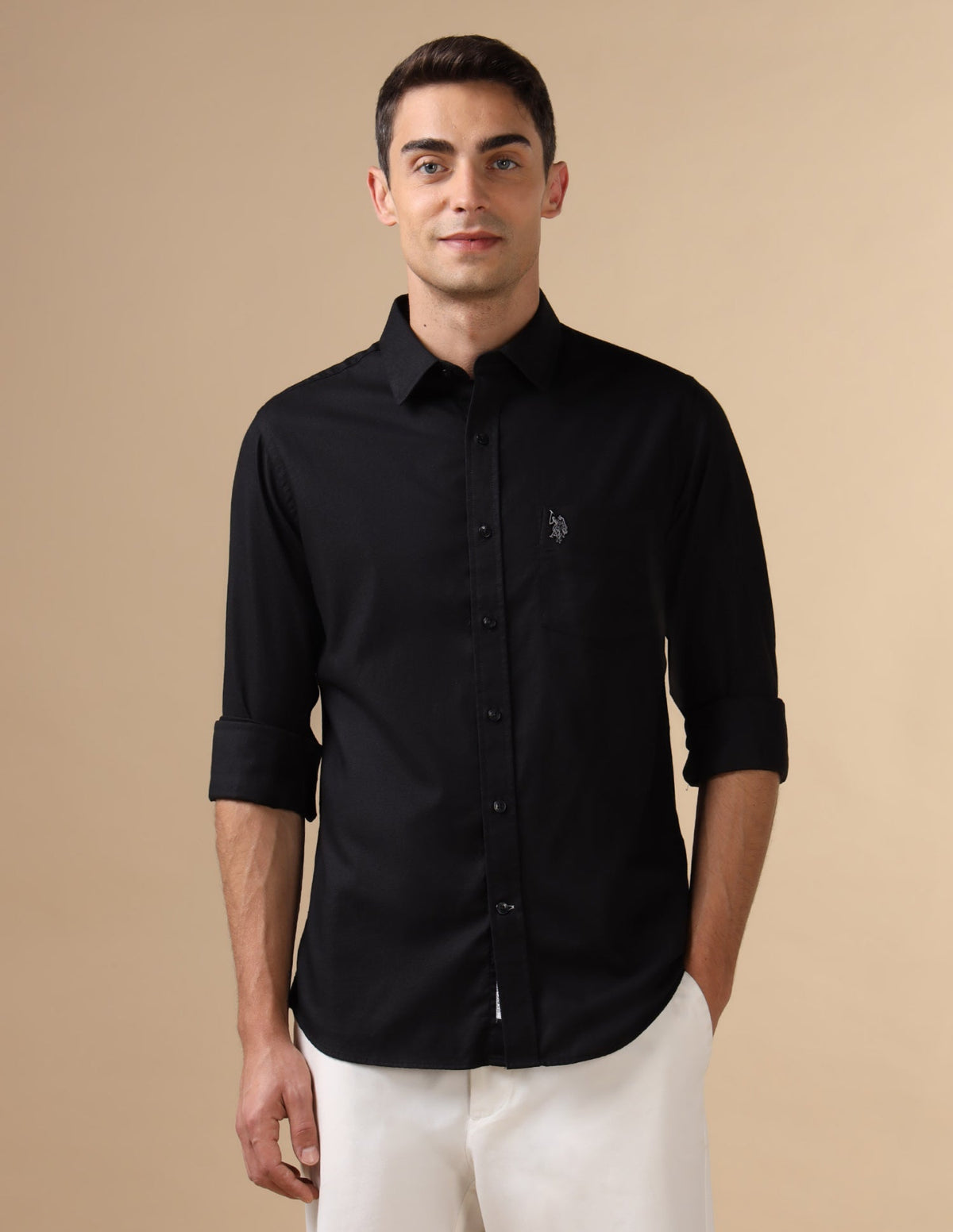 U.S. Polo men's casual shirt in lightweight fabric, featuring a classic collar and button-down front, displayed on a hanger.