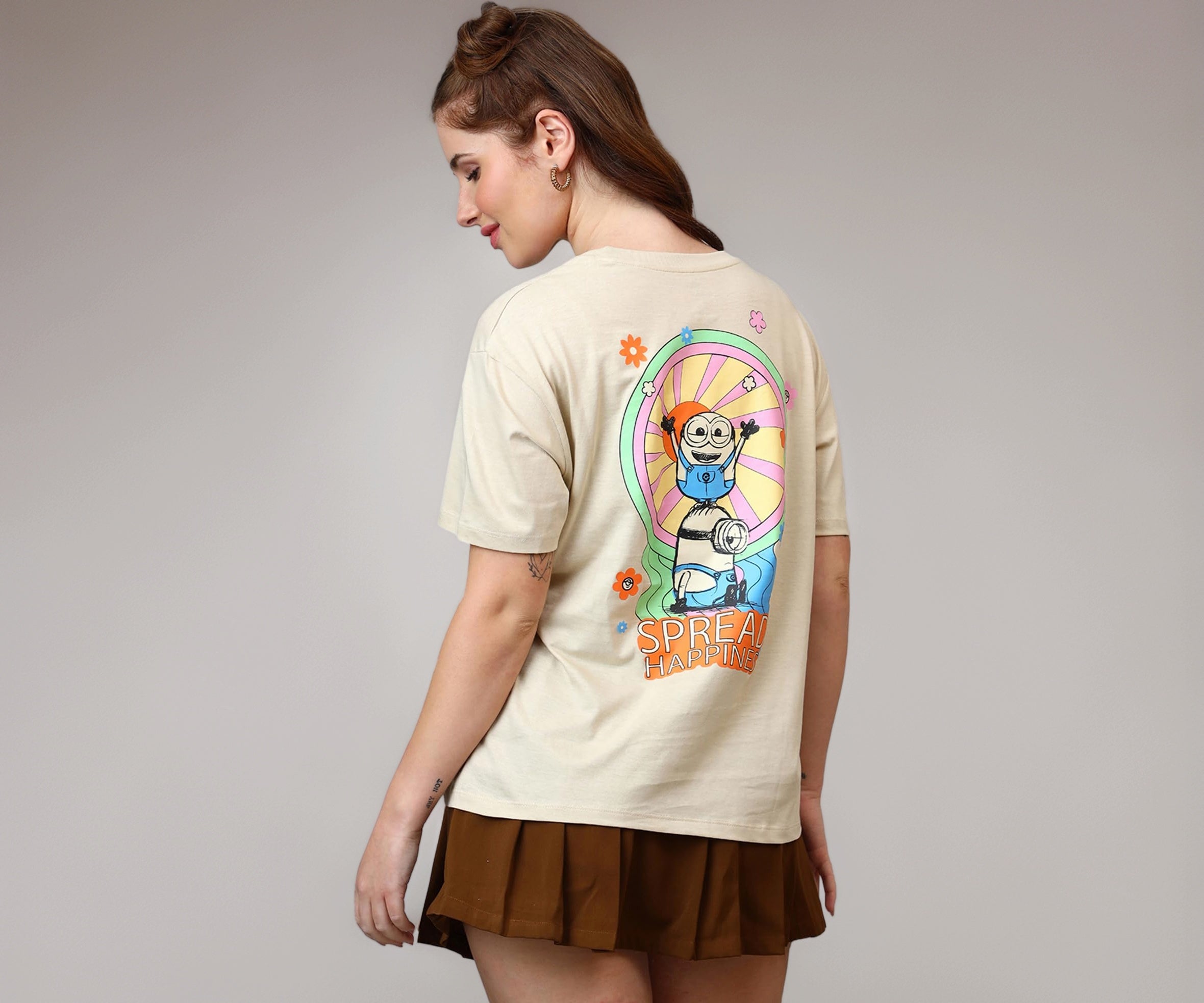 Free Authority Official Minions: Spread Happines Graphic Printed Pure Cotton Beige Oversized Tshirt for Women