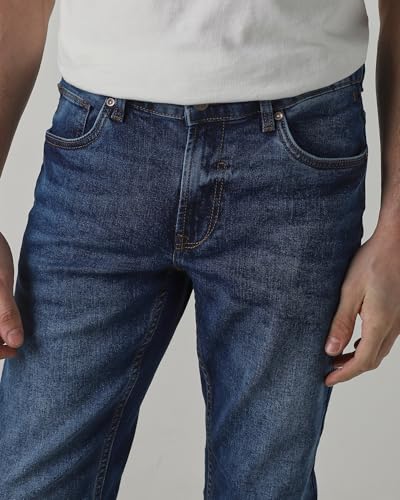 Mufti men's super slim fit mid-rise jeans in medium wash denim with five-pocket style and stretch fabric for casual or smart casual wear.