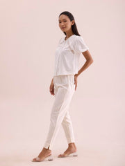 GO COLORS Women Solid Cream Cotton Pencil Pant