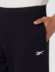 Reebok men's black Dash pants, sporty men's sportswear and pajama pants with comfortable fit and athletic style.