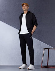Reebok men's black Dash pants, sportswear pajama style, with elastic waistband and comfortable fit, suitable for athletic wear or lounge.