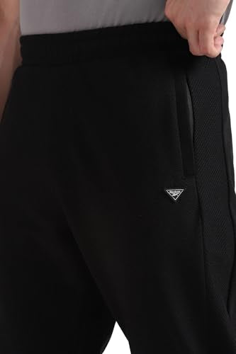 Reebok men's black sportswear pajama pants, comfortable fit, featuring a relaxed design and elastic waistband.