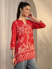 Libas printed silk blend straight short kurti for ladies, featuring colorful patterns and a comfortable fit.