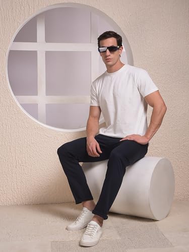 Navy blue casual trousers for men by Crimsoune Club, made from comfortable fabric, shown on a model.