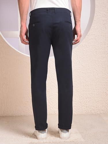 Men's navy blue casual trousers by Crimsoune Club, tailored fit with smooth fabric, suitable for everyday wear.