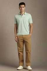 Men Green Solid Polo Neck T-Shirt