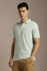 Men Green Solid Polo Neck T-Shirt