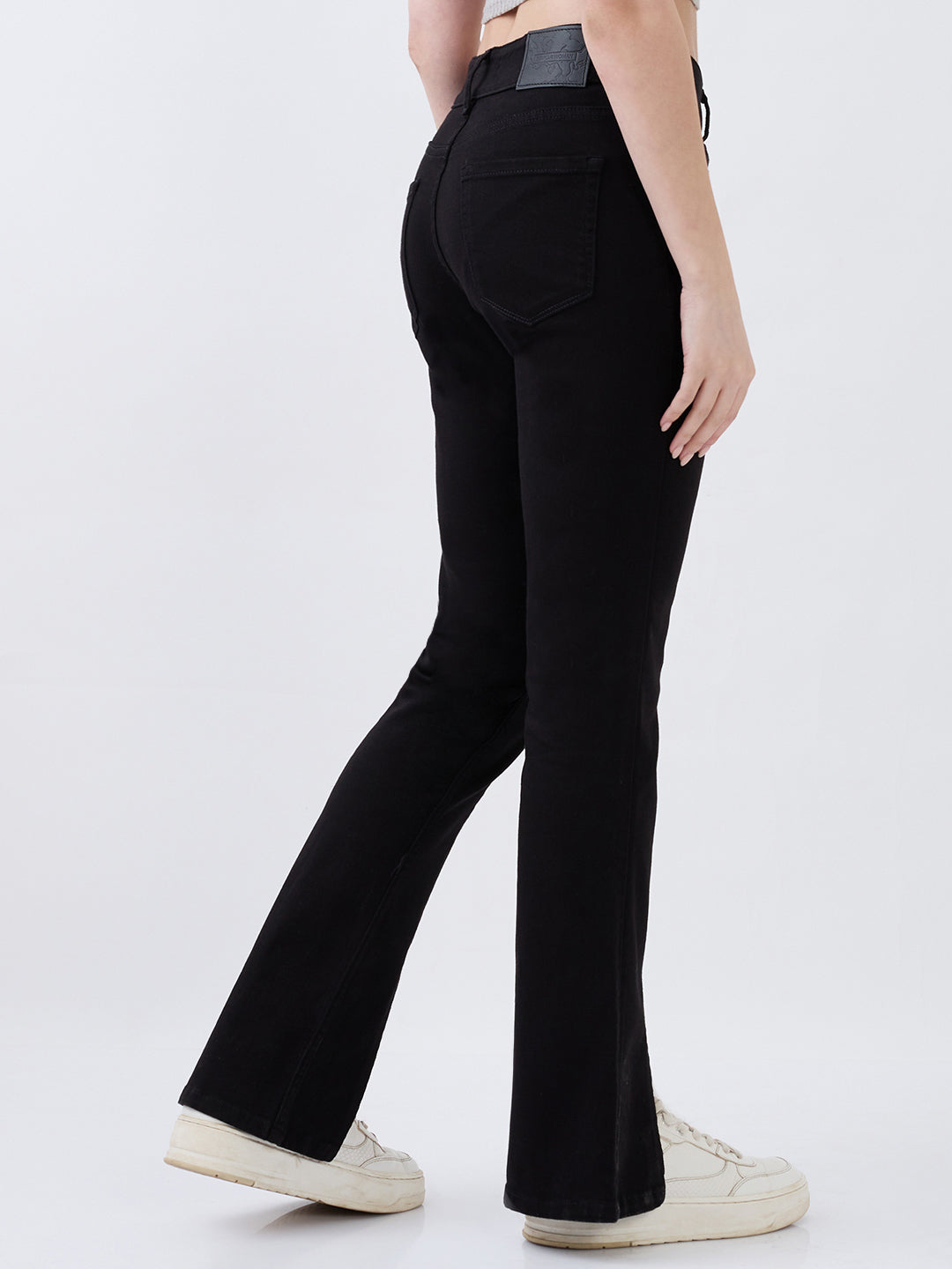 Black Spykar ladies Western jeans with a slim fit design, displayed on a neutral background.