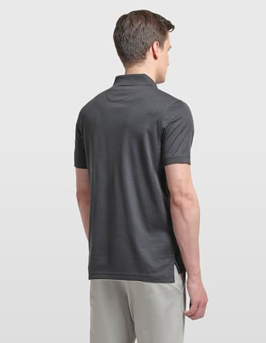 Arrow men's solid regular fit polo shirt, long-sleeve T-shirt style in classic design, displayed on a hanger.