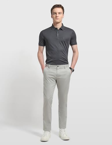 Arrow men's solid regular fit polo shirt in a classic design, shown in a close-up view of the upper front.