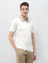 U.S. Polo Association men's solid slim fit polo shirt in classic design, short sleeve, with collar and button placket.