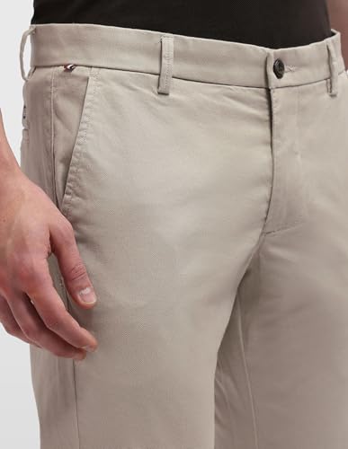 Arrow Sport men's Bronson slim fit chinos, casual trousers in a stylish art-inspired design, shown on a model.