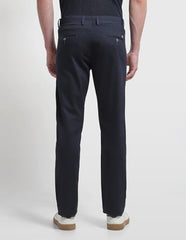 Arrow Sport men's solid Bronson slim fit casual trousers, showing navy blue fabric, front pockets, and tailored slim silhouette.
