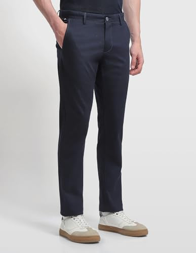 Arrow Sport men's solid Bronson slim fit casual trousers, dark fabric, front pockets, and tailored fit for a modern look.