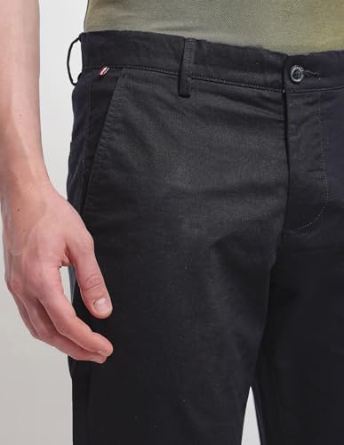 Arrow Sport men's solid Bronson slim fit casual trousers, shown in dark fabric with classic design and tailored fit.