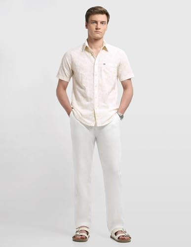 Arrow Sport men's floral printed casual shirt in sage and sun colors, with a button-up front and classic collar.