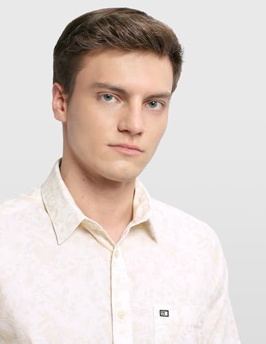 Arrow Sport men's floral printed casual shirt in sage and sun colors, featuring a relaxed fit and button-down design.
