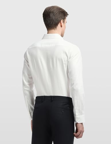 Arrow Men's Dobby Originals Formal Shirt, light blue with subtle pattern, long sleeves, classic collar, front button closure.