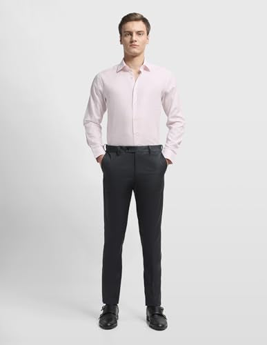 Arrow Men's Dobby Originals formal shirt, light blue with subtle pattern, long sleeves, and classic collar, displayed on a hanger.