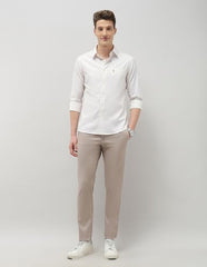 U.S.Polo Association men's Casa De Campo regular fit casual shirt in light fabric, shown on a hanger with a collar and button closure.