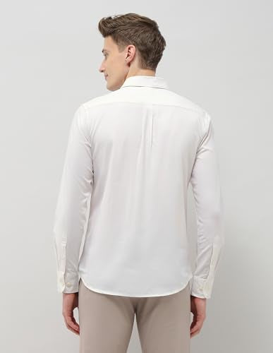 U.S.Polo Association men's Casa De Campo regular fit casual shirt in light fabric, displayed on a hanger with a collar and button details.