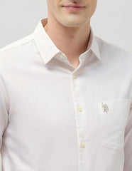 U.S.Polo Association men's Casa De Campo casual regular fit shirt in light fabric, displayed on a hanger.