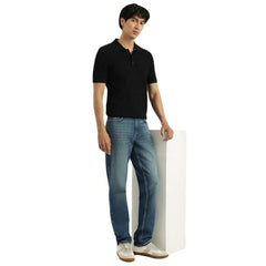 United Colors of Benetton men's washed straight fit jeans, denim fabric, front view showing classic pockets and fit.